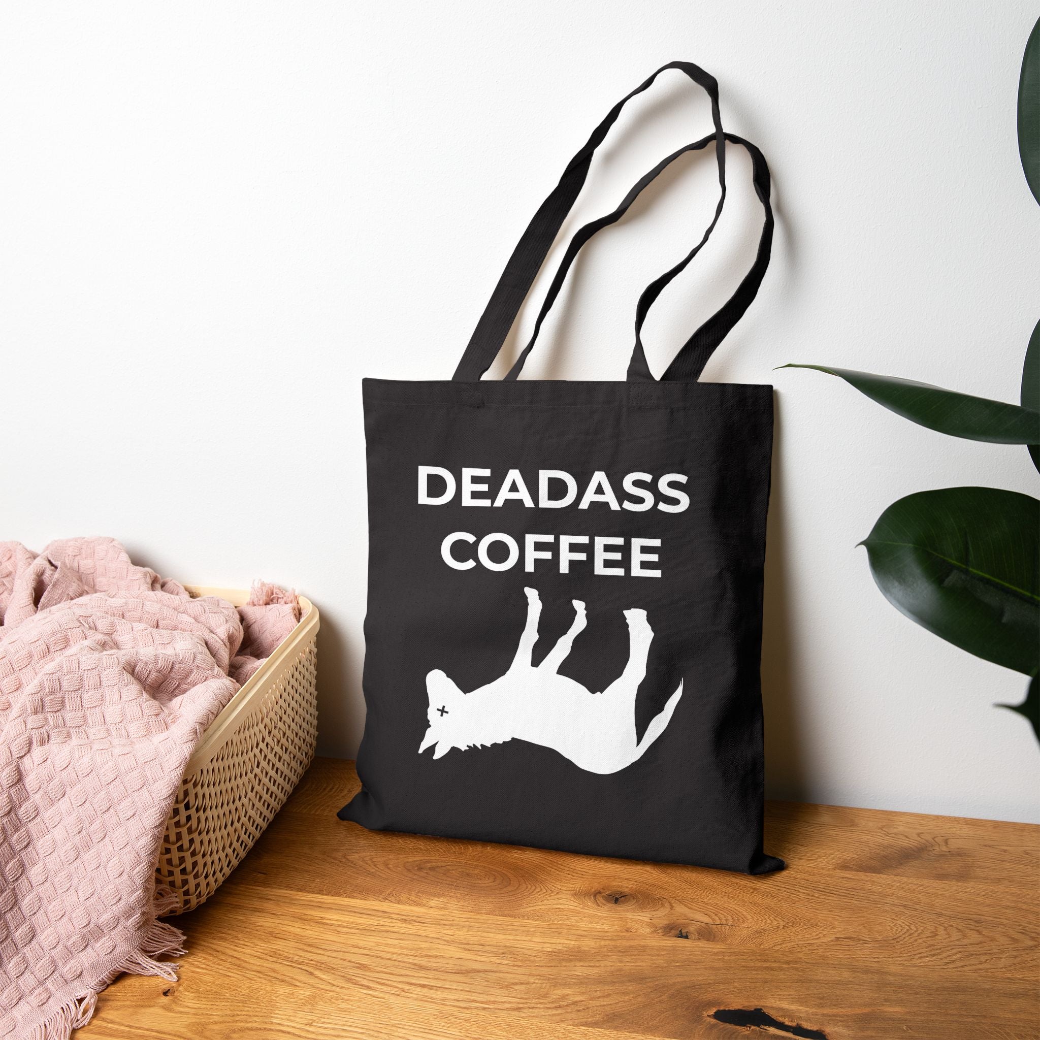 Black Deadass Tote against the wall